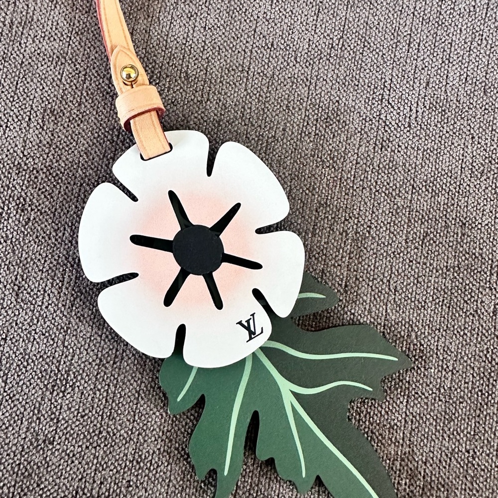 By the pool key chain flower